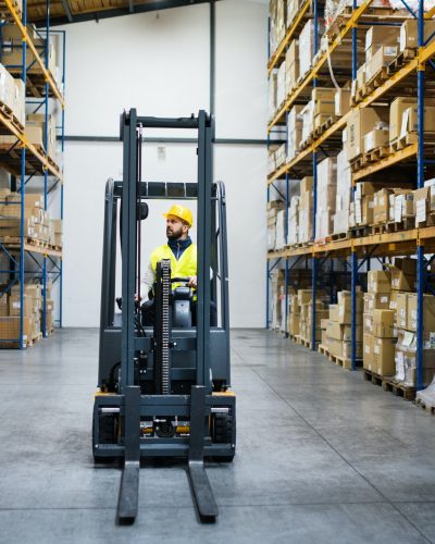 warehouse-man-worker-with-forklift-.jpg